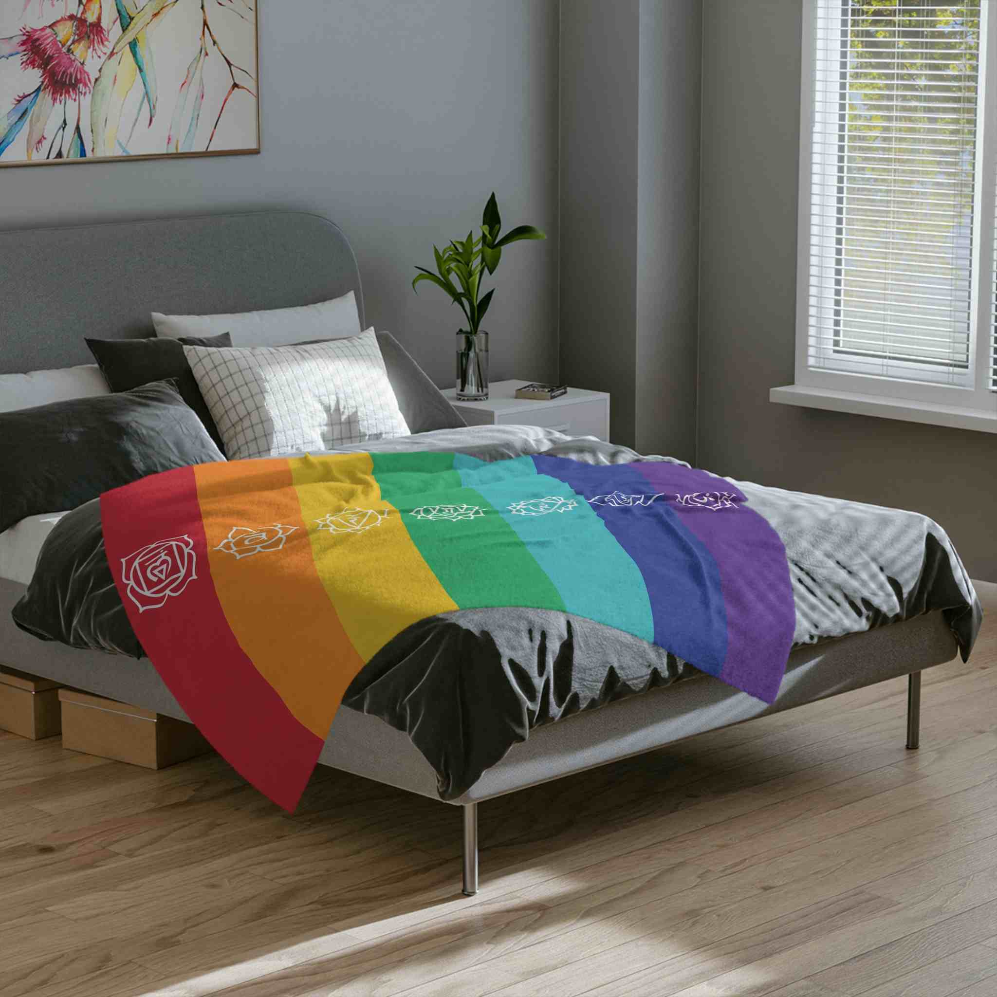 7 Chakra Healing Blanket draped over a bed, creating a cozy and holistic environment for energy balancing and relaxation.
